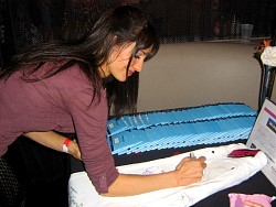 charlene amoia signing wizard jeans for charity.jpg