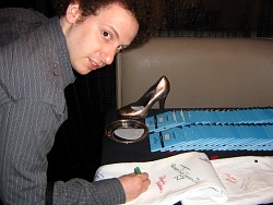 josh sussman signing wizard jeans for charity.jpg