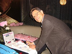 nicholas guest signing wizard jeans for charity.jpg