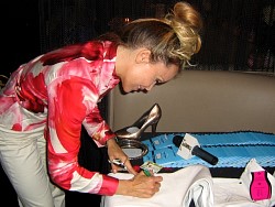 tamara henry 'green t'2 signing wizard jeans for charity.jpg